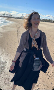 Image of the author happy next to the Mediterranean Sea for the first time